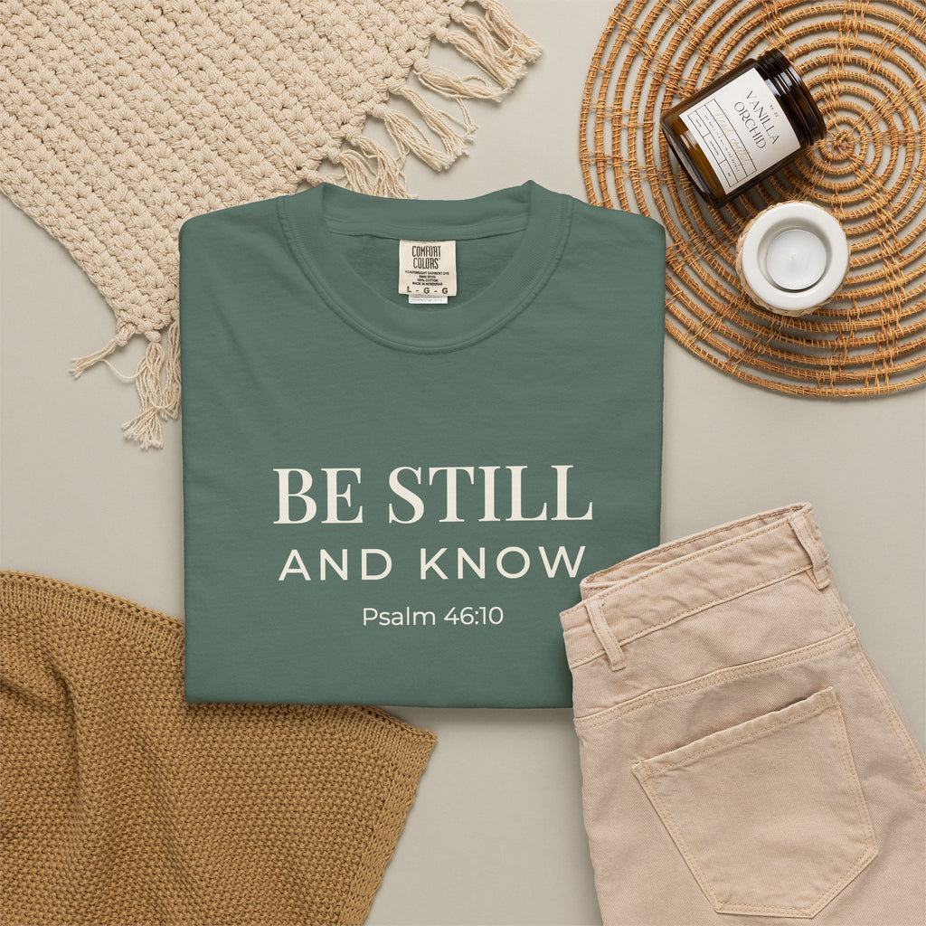 Be Still and Know Psalm 46:10 tee in blue spruce, folded flat lay mockup