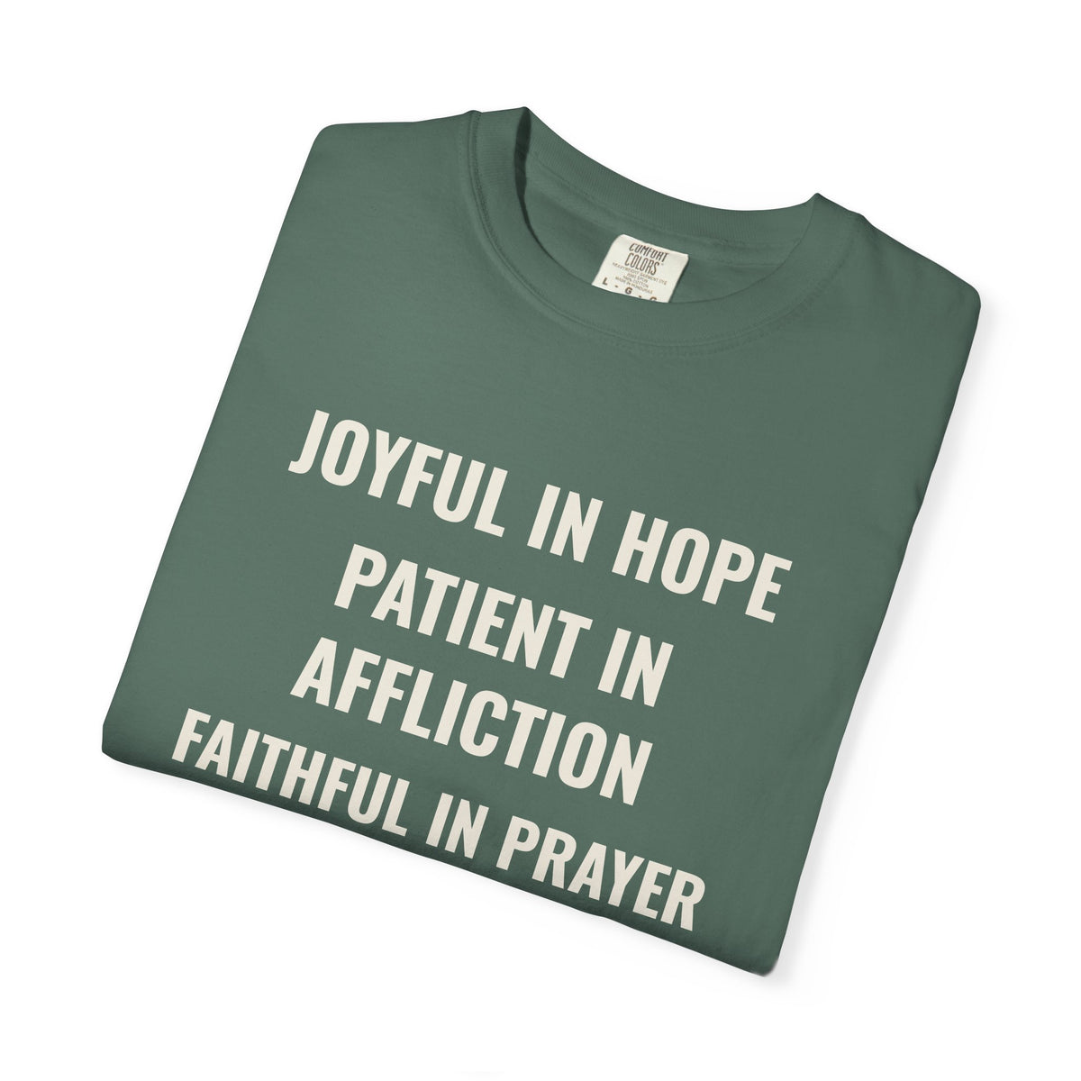 Joyful in Hope Romans 12:12 tee in blue spruce, folded mockup