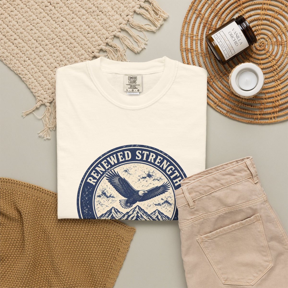Renew Your Strength Isaiah 40:31 tee in ivory, folded flat lay mockup