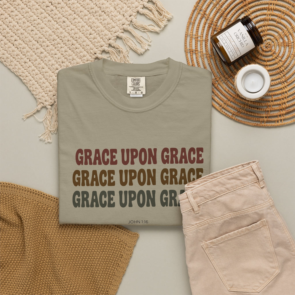 Grace Upon Grace John 1:16 tee in sandstone, folded flat lay mockup