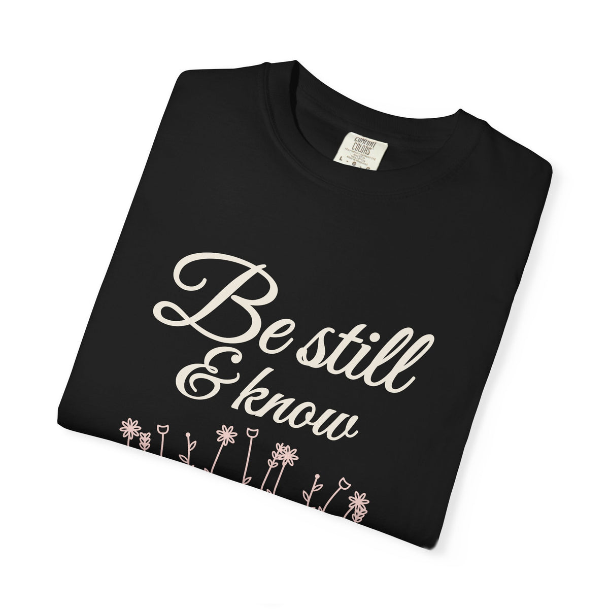 Be Still & Know Wildflower Psalm 46:10 Christian tee in black, folded mockup
