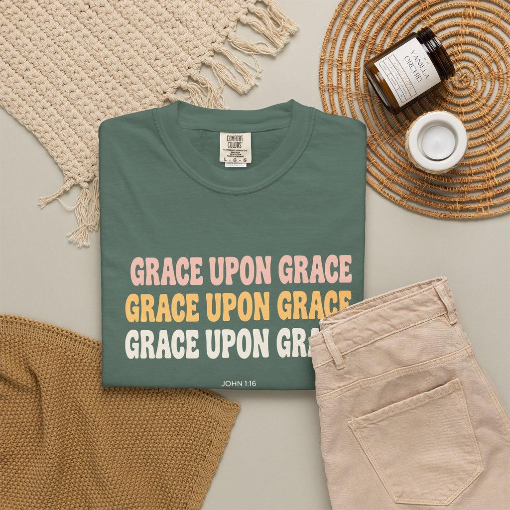 Grace Upon Grace John 1:16 tee in blue spruce, folded flat lay mockup