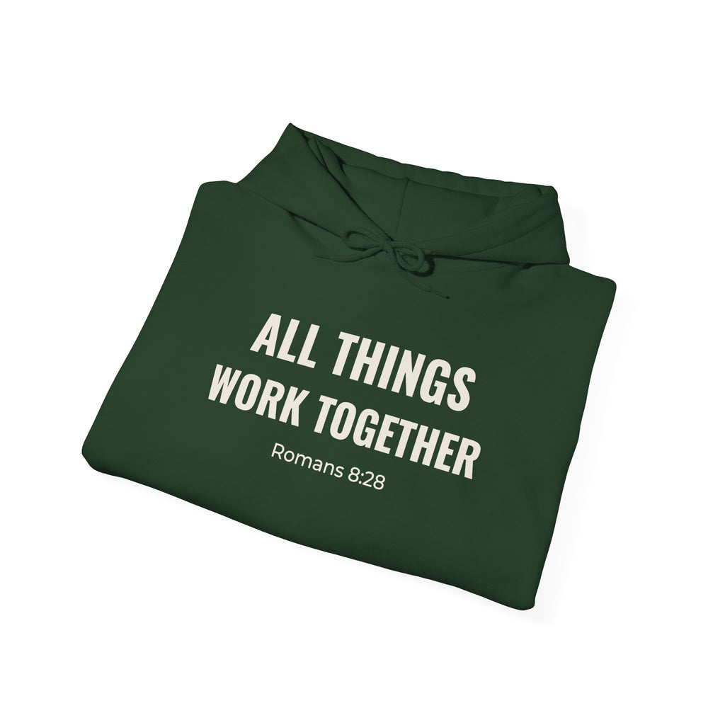 All Things Work Together Romans 8:28 hoodie in forest green, folded mockup