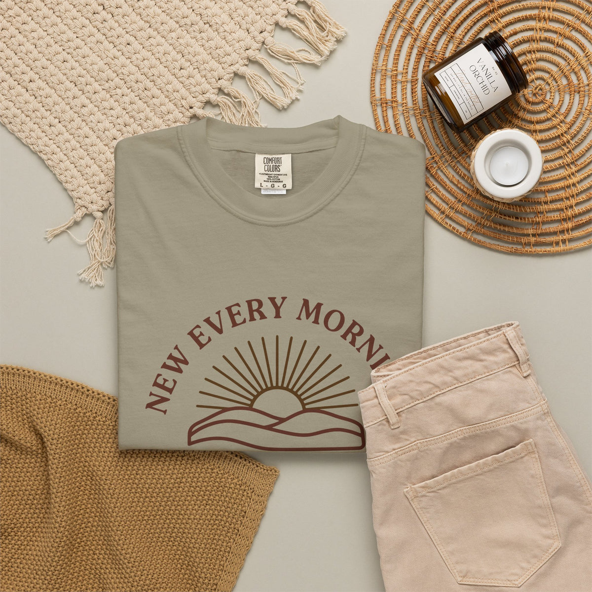 New Every Morning Lamentations 3:22-23 tee in sandstone, folded flat lay mockup