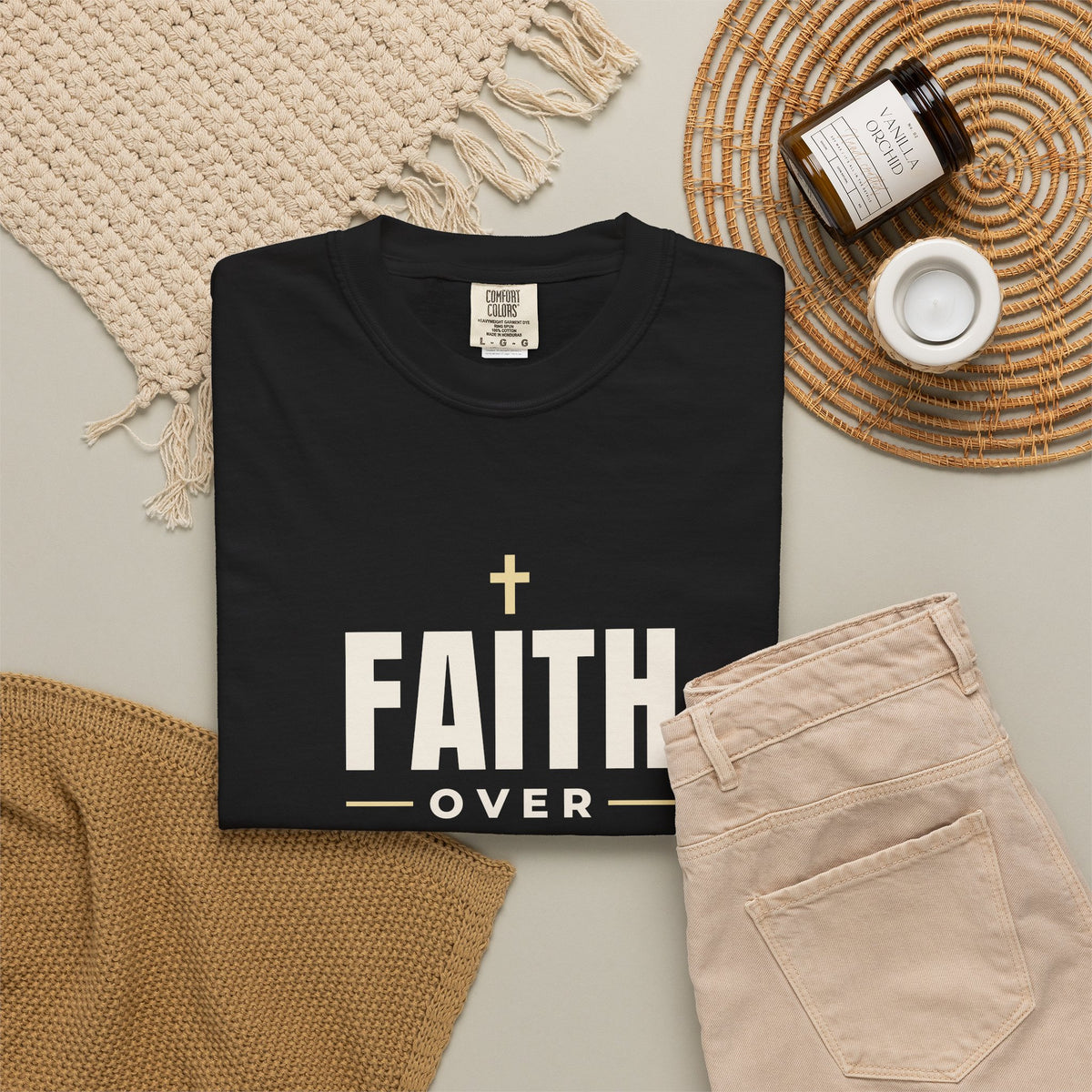 Faith Over Fear Christian tee in black, folded flat lay
