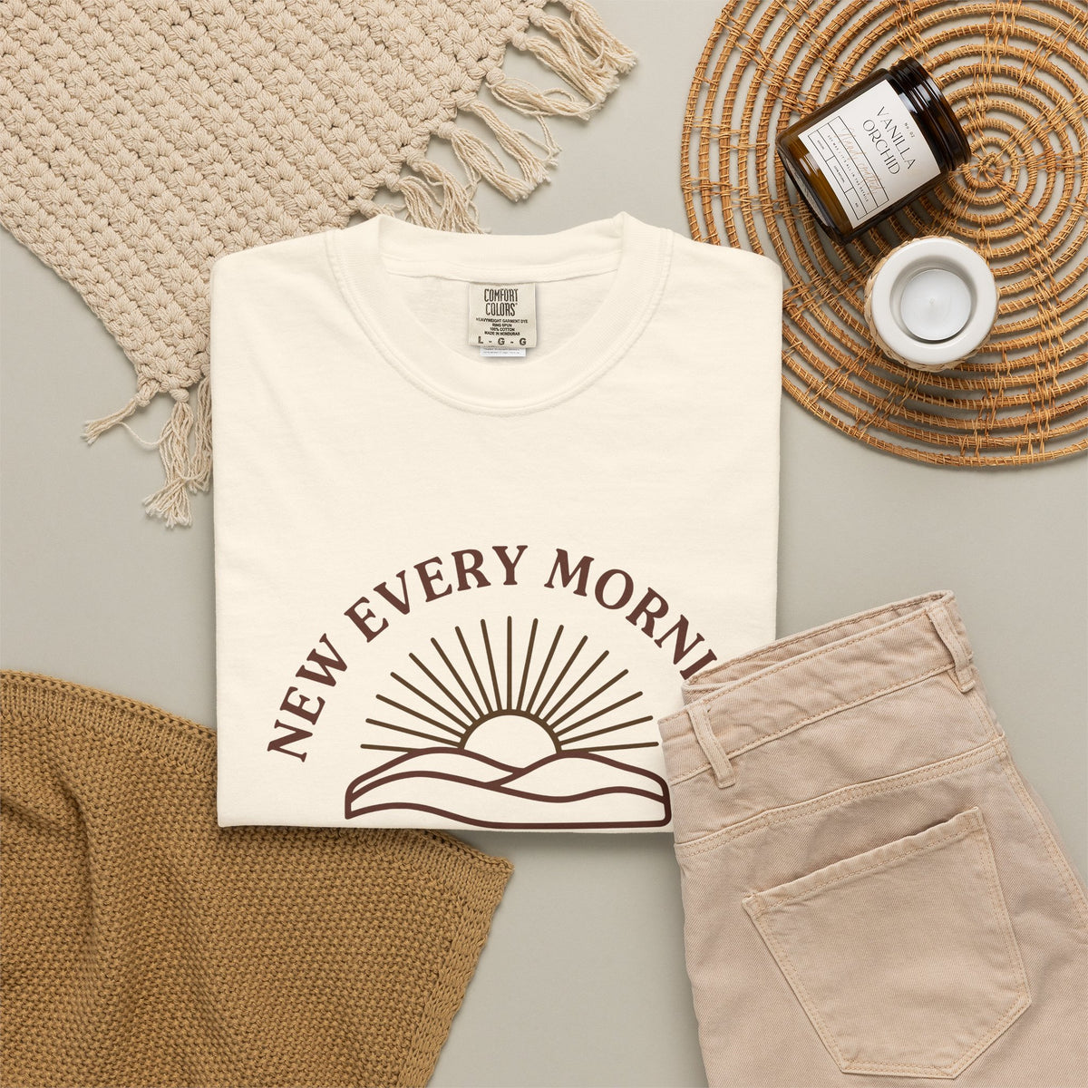New Every Morning Lamentations 3:22-23 tee in ivory, folded flat lay mockup