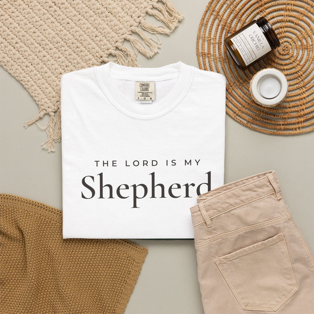 The Lord Is My Shepherd Psalm 23:1 Christian tee in white, folded flat lay