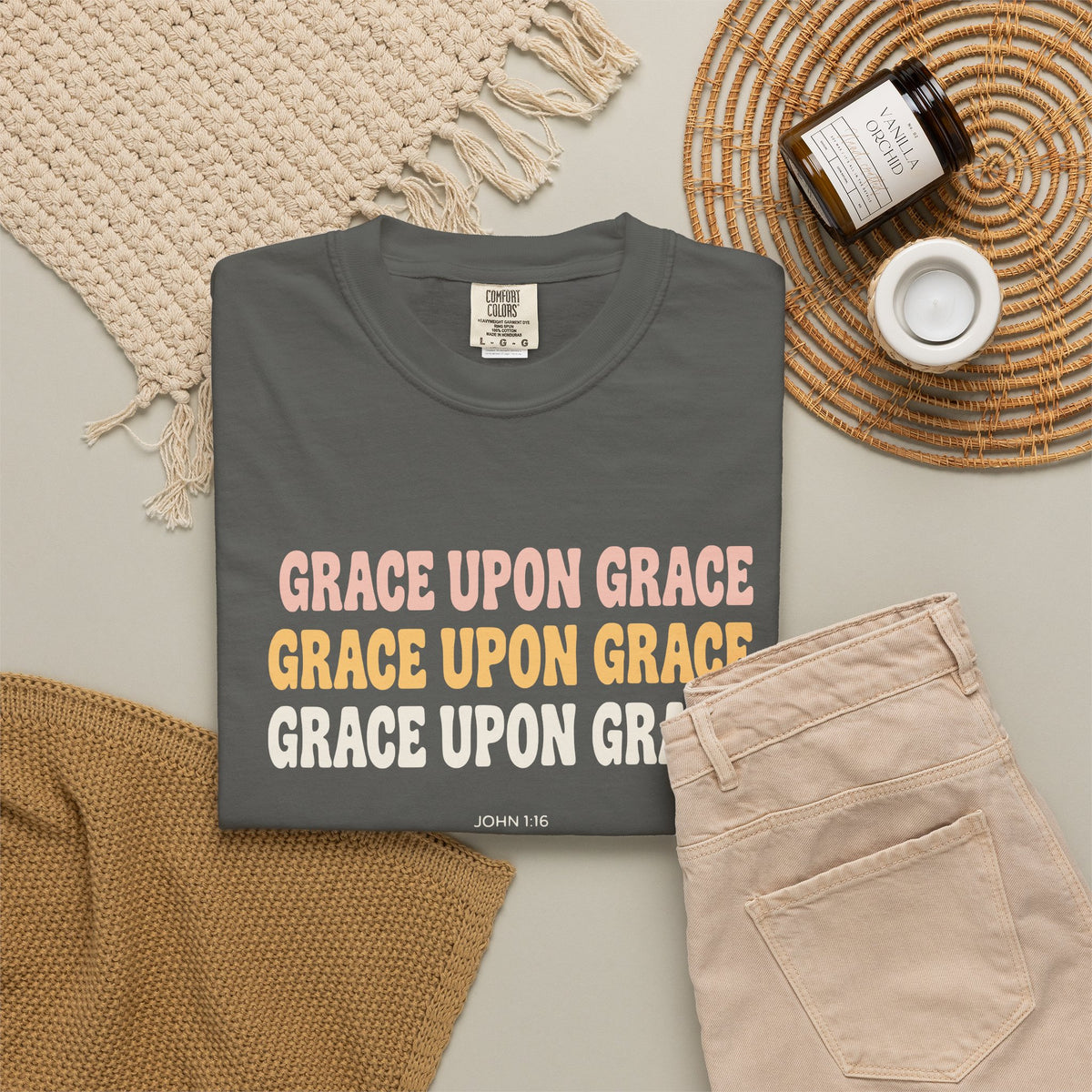 Grace Upon Grace John 1:16 tee in pepper, folded flat lay mockup