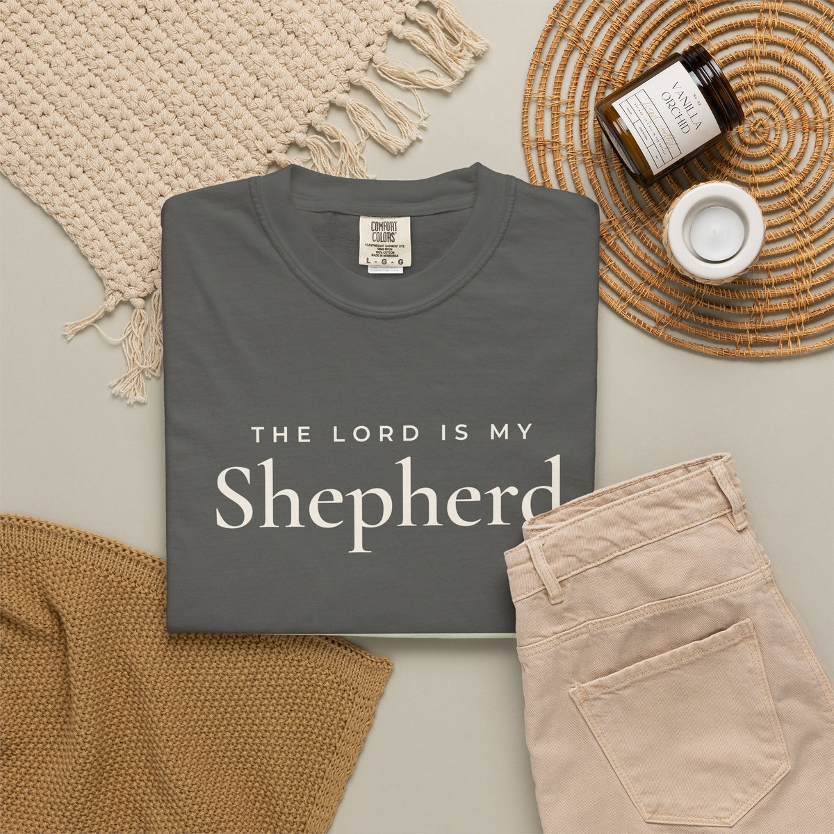 The Lord Is My Shepherd Psalm 23:1 Christian tee in pepper, folded flat lay