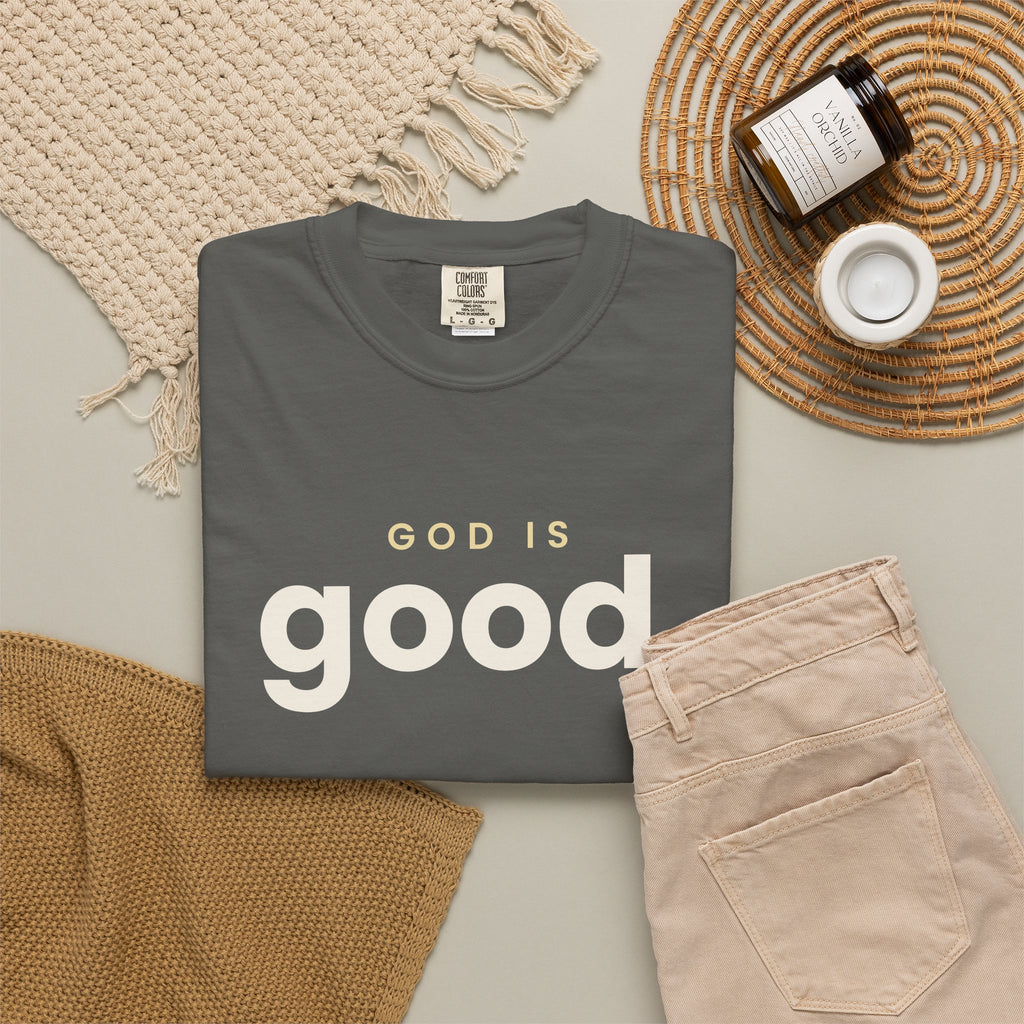 God Is Good Christian tee in pepper, folded flat lay
