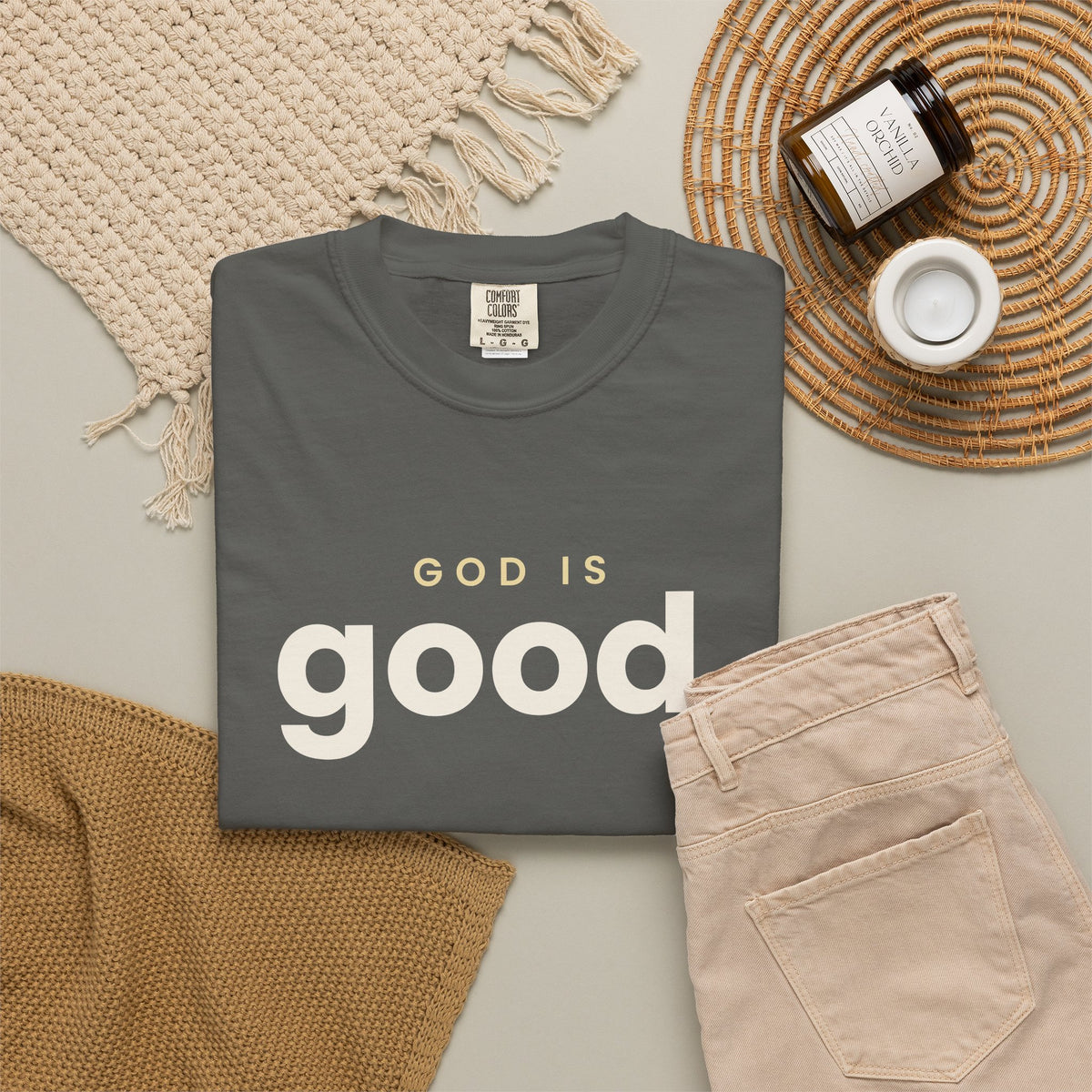 God Is Good Christian tee in pepper, folded flat lay