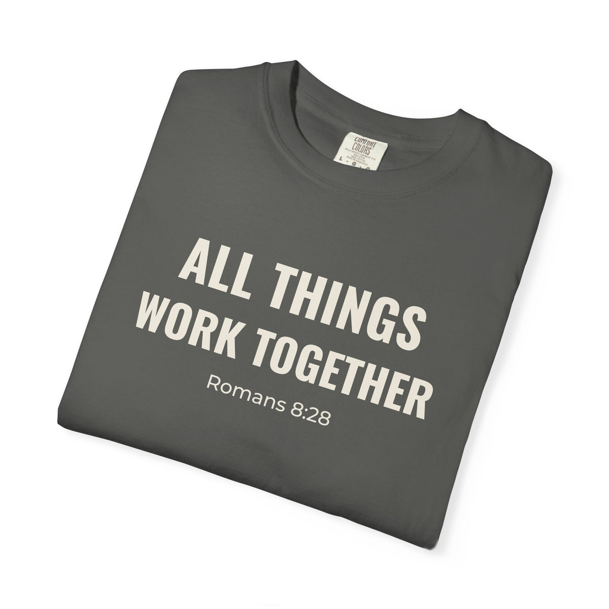 All Things Work Together Romans 8:28 tee in pepper, folded mockup