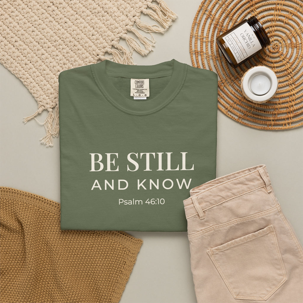 Be Still and Know Psalm 46:10 tee in sage, folded flat lay mockup