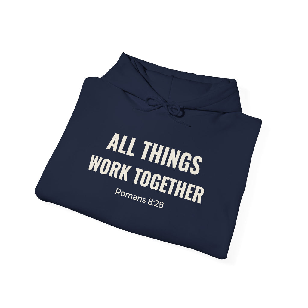 All Things Work Together Romans 8:28 hoodie in navy, folded mockup