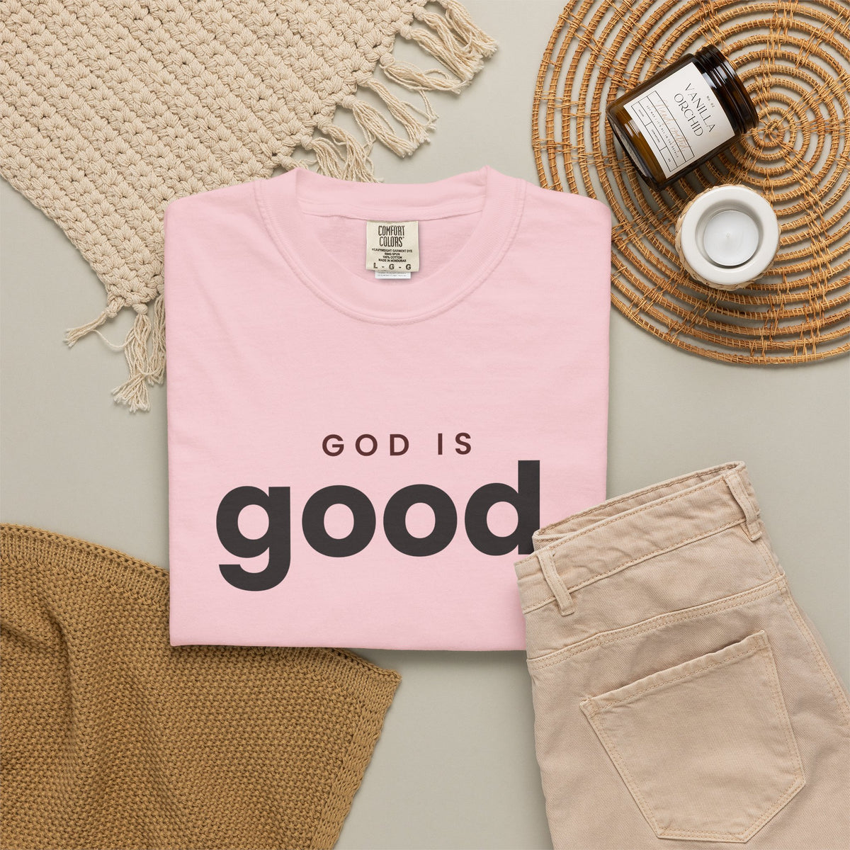 God Is Good Christian tee in blossom, folded flat lay