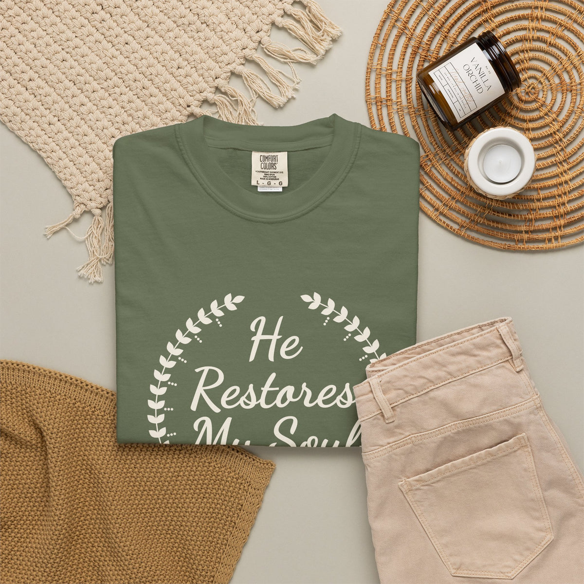 He Restores My Soul Psalm 23:3 tee in sage, folded flat lay mockup