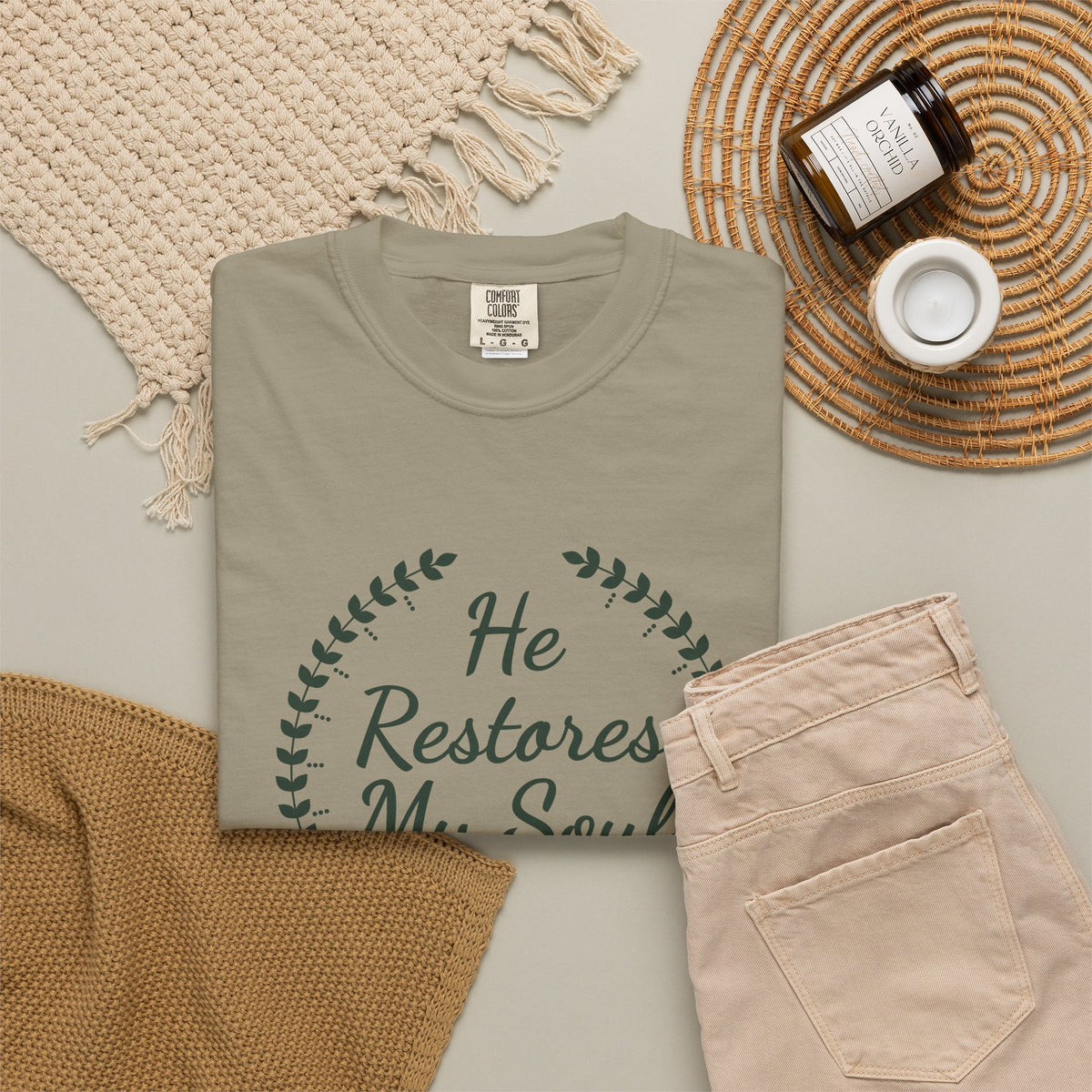 He Restores My Soul Psalm 23:3 tee in sandstone, folded flat lay mockup