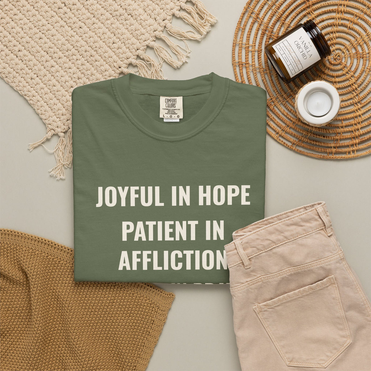 Joyful in Hope Romans 12:12 tee in sage, folded flat lay mockup