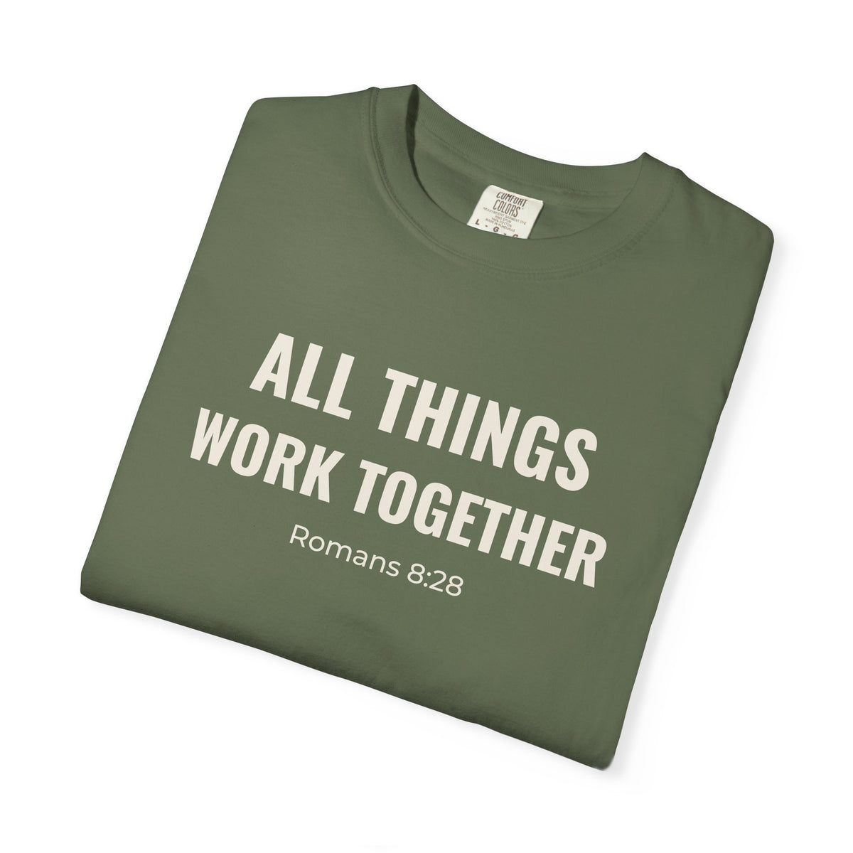 All Things Work Together Romans 8:28 tee in sage, folded mockup