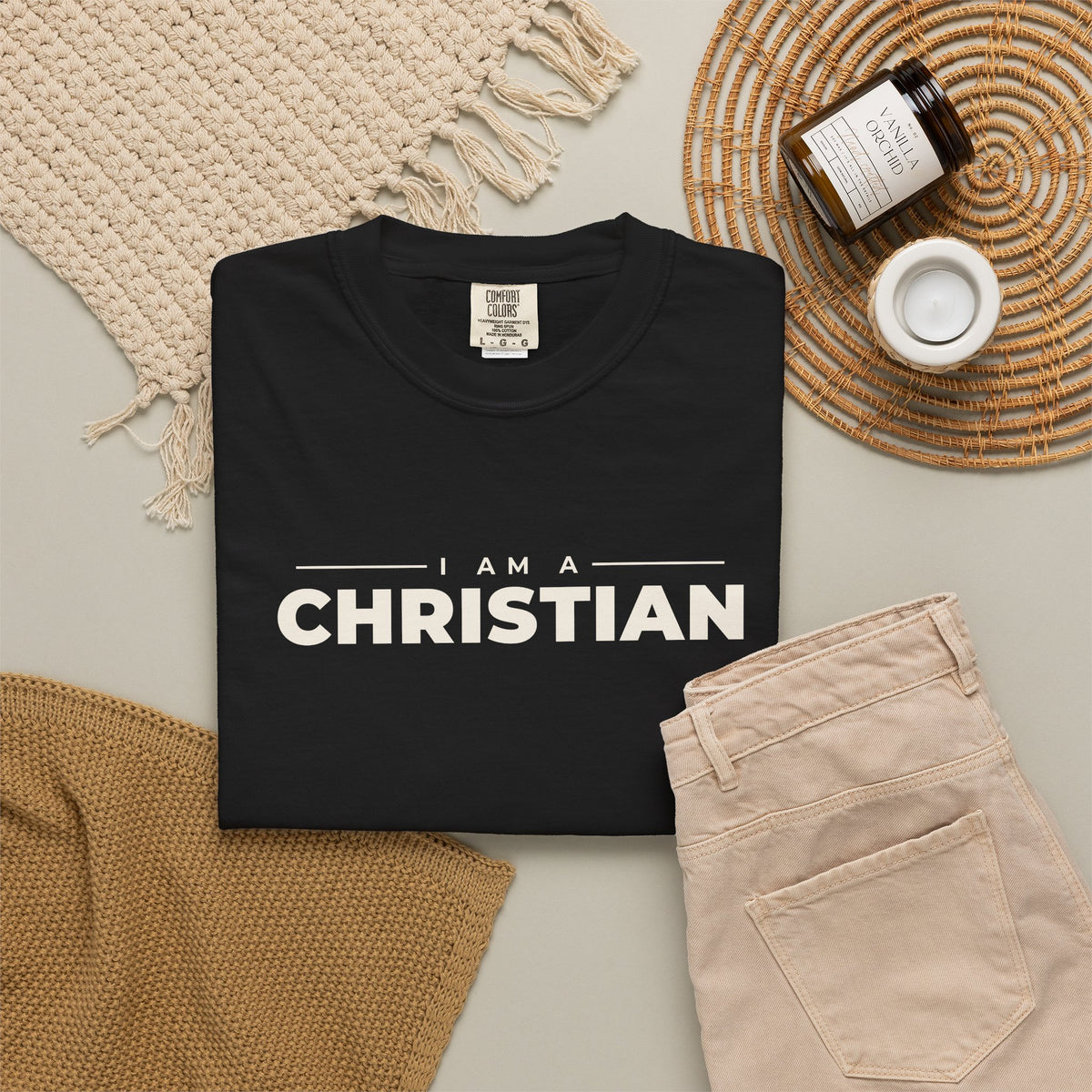 I Am a Christian Christian tee in black, folded flat lay
