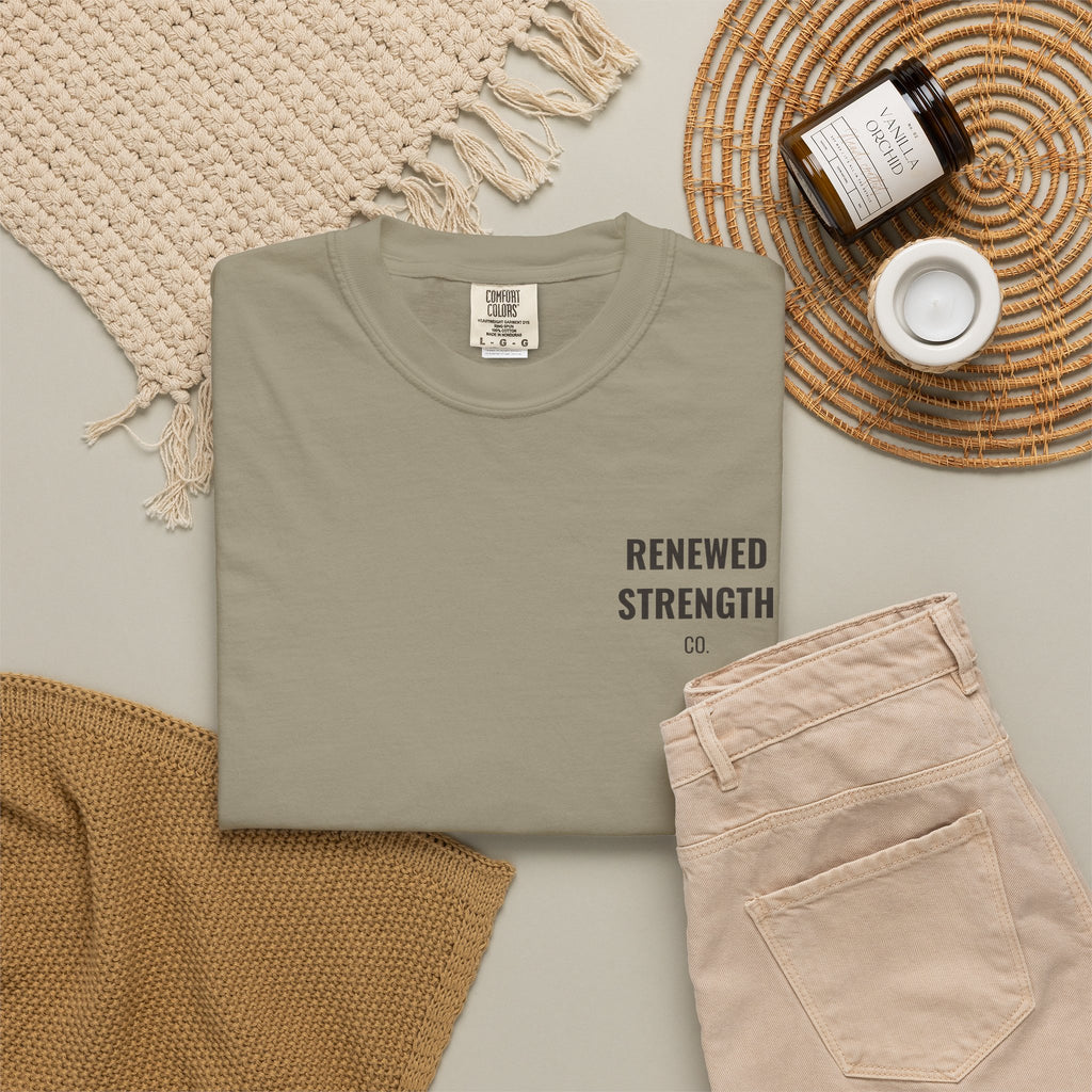 Suffering Produces Hope Romans 5:3-4 tee in sandstone, folded flat lay mockup