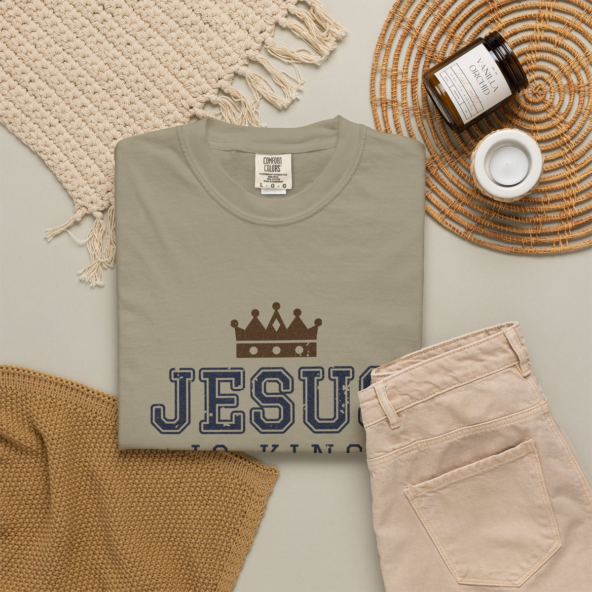 Jesus Is King Christian tee in sandstone, folded flat lay