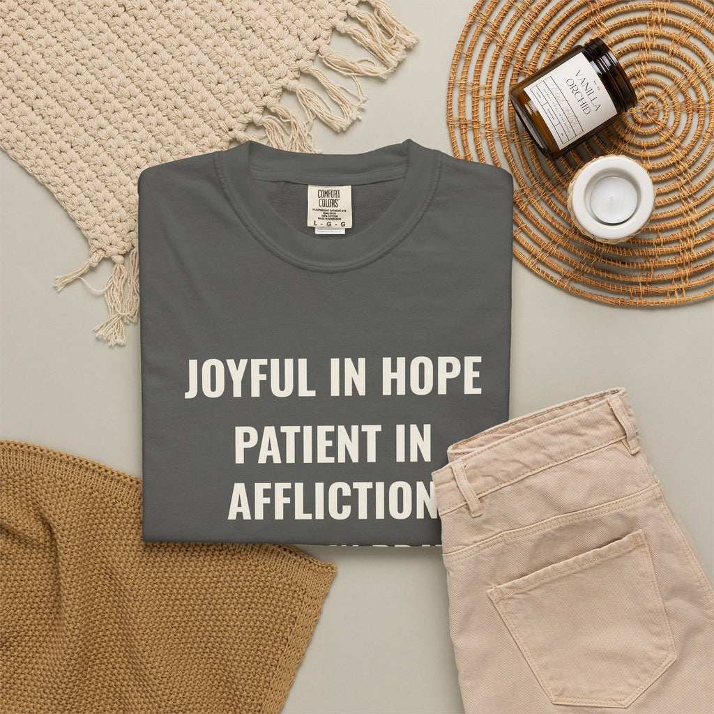 Joyful in Hope Romans 12:12 tee in pepper, folded flat lay mockup