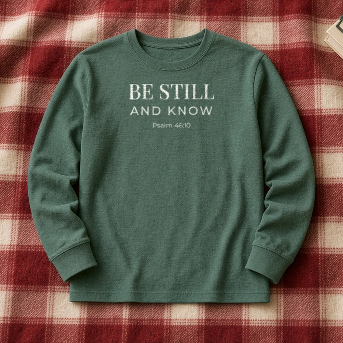 Be Still and Know Psalm 46:10 blue spruce long sleeve, flat lay