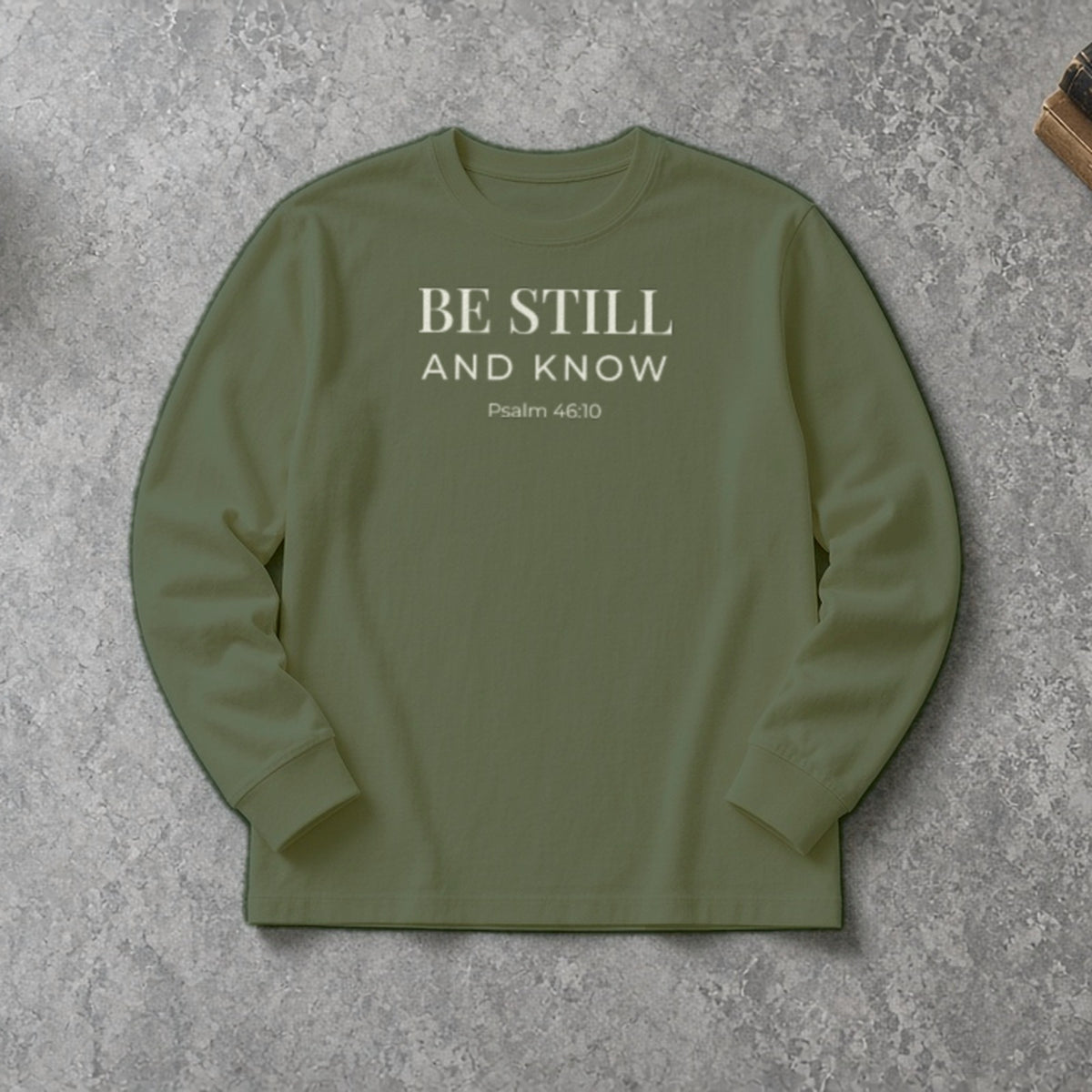 Be Still and Know Psalm 46:10 hemp long sleeve, flat lay