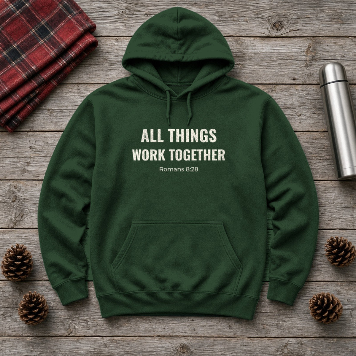 All Things Work Together Romans 8:28 forest green hoodie, flat lay