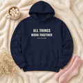 All Things Work Together Romans 8:28 navy hoodie, flat lay