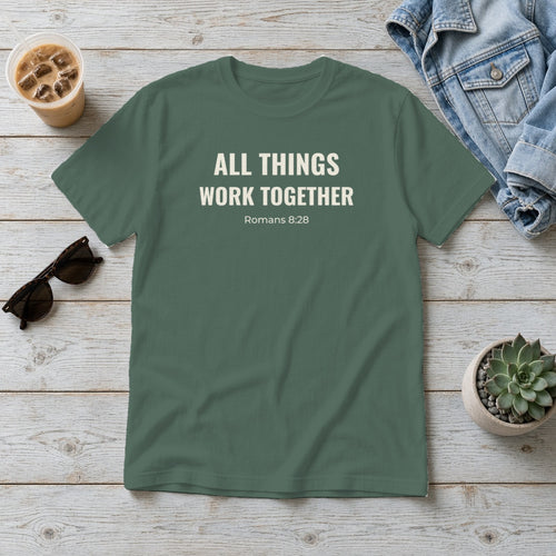 All Things Work Together Romans 8:28 blue spruce tee, flat lay
