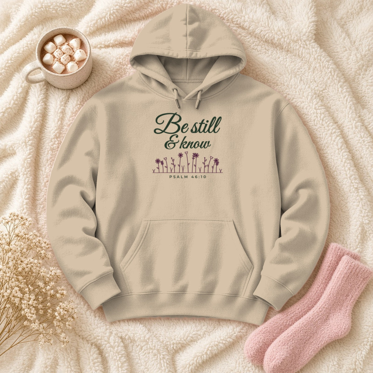 Be Still & Know Wildflower Psalm 46:10 Christian hoodie in sand, styled flat lay