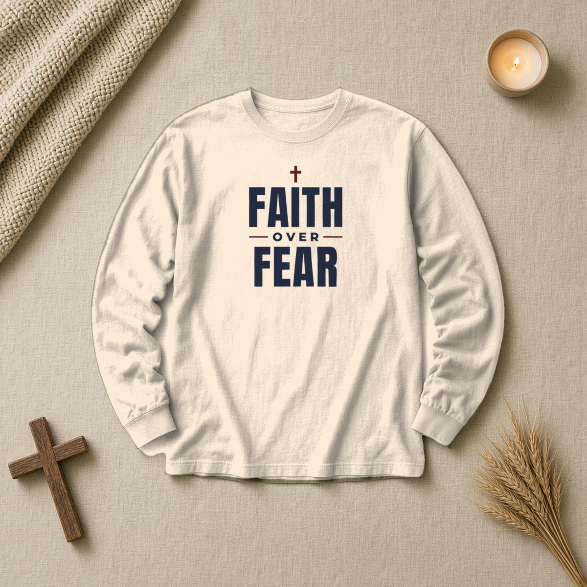 Faith Over Fear Christian long sleeve tee in ivory, styled flat lay