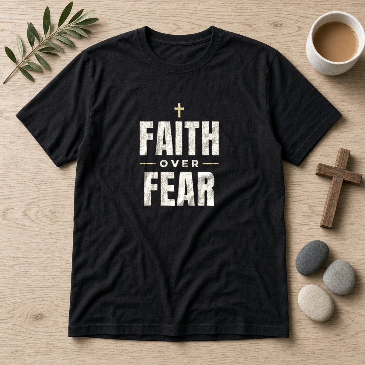 Faith Over Fear Christian tee in black, styled flat lay
