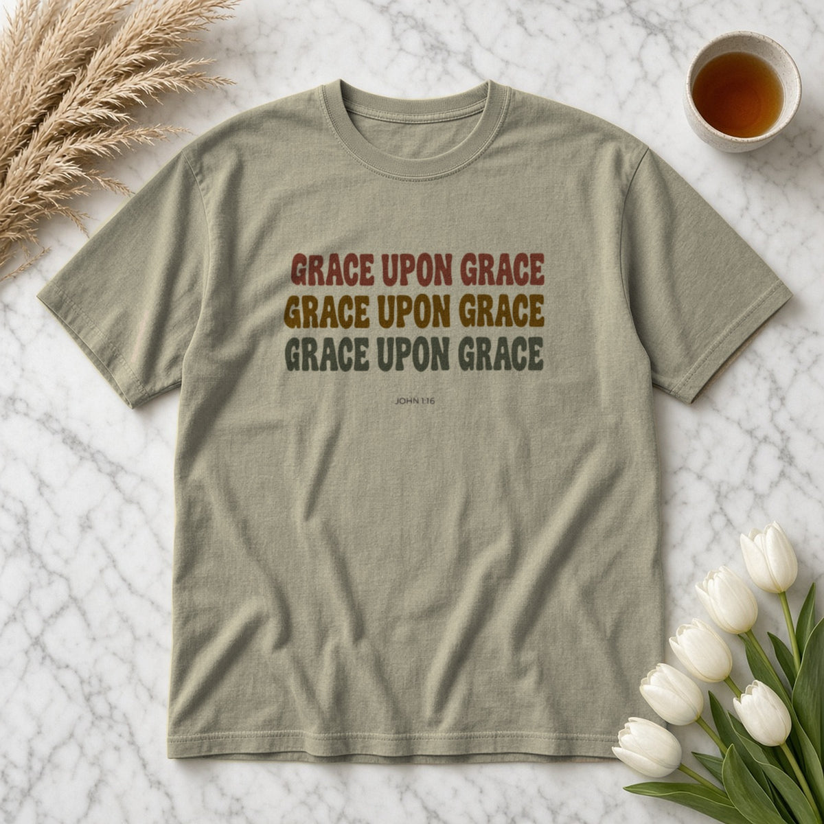 Grace Upon Grace John 1:16 sandstone tee, flat lay