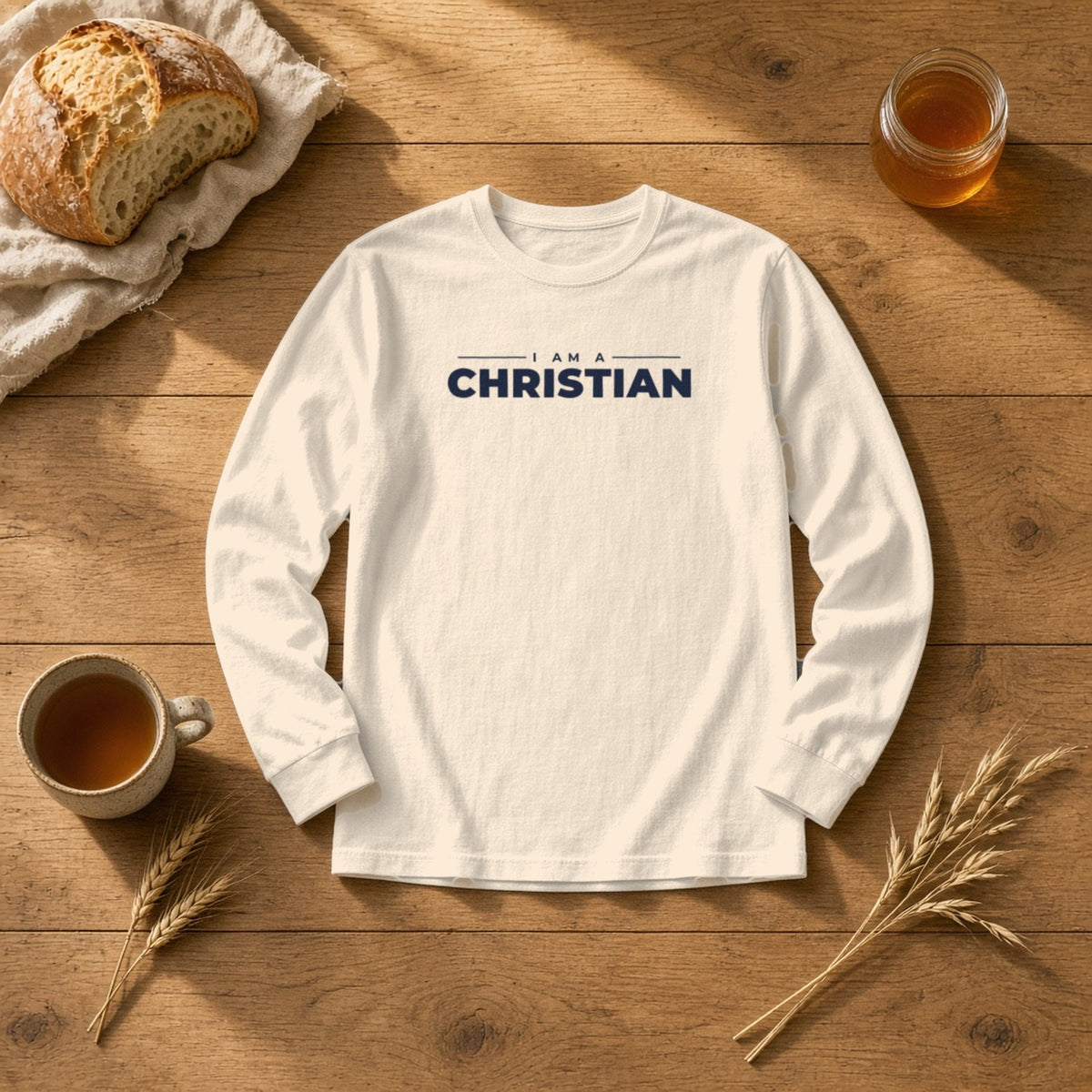 I Am a Christian long sleeve tee in ivory, styled flat lay