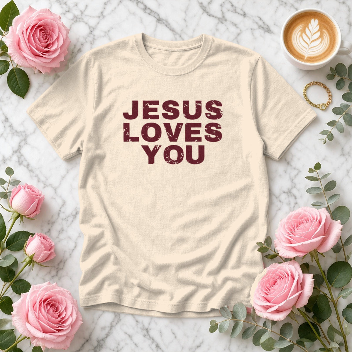 Jesus Loves You Christian tee in ivory, styled flat lay