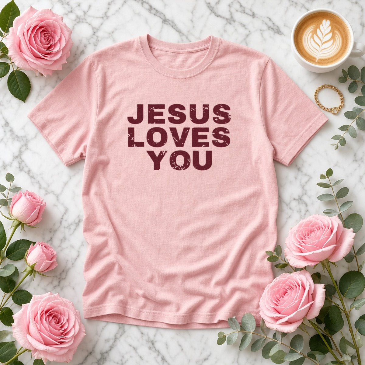 Jesus Loves You Christian tee in blossom, styled flat lay