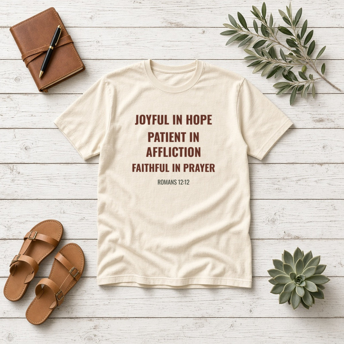 Joyful in Hope Romans 12:12 ivory tee, flat lay