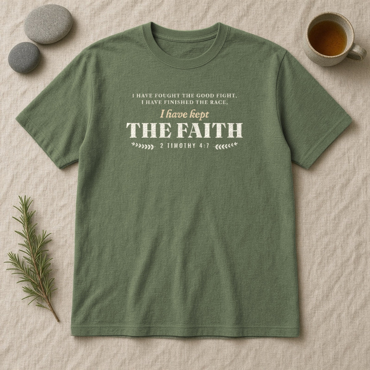 Kept the Faith 2 Timothy 4:7 tee in Sage, flat lay