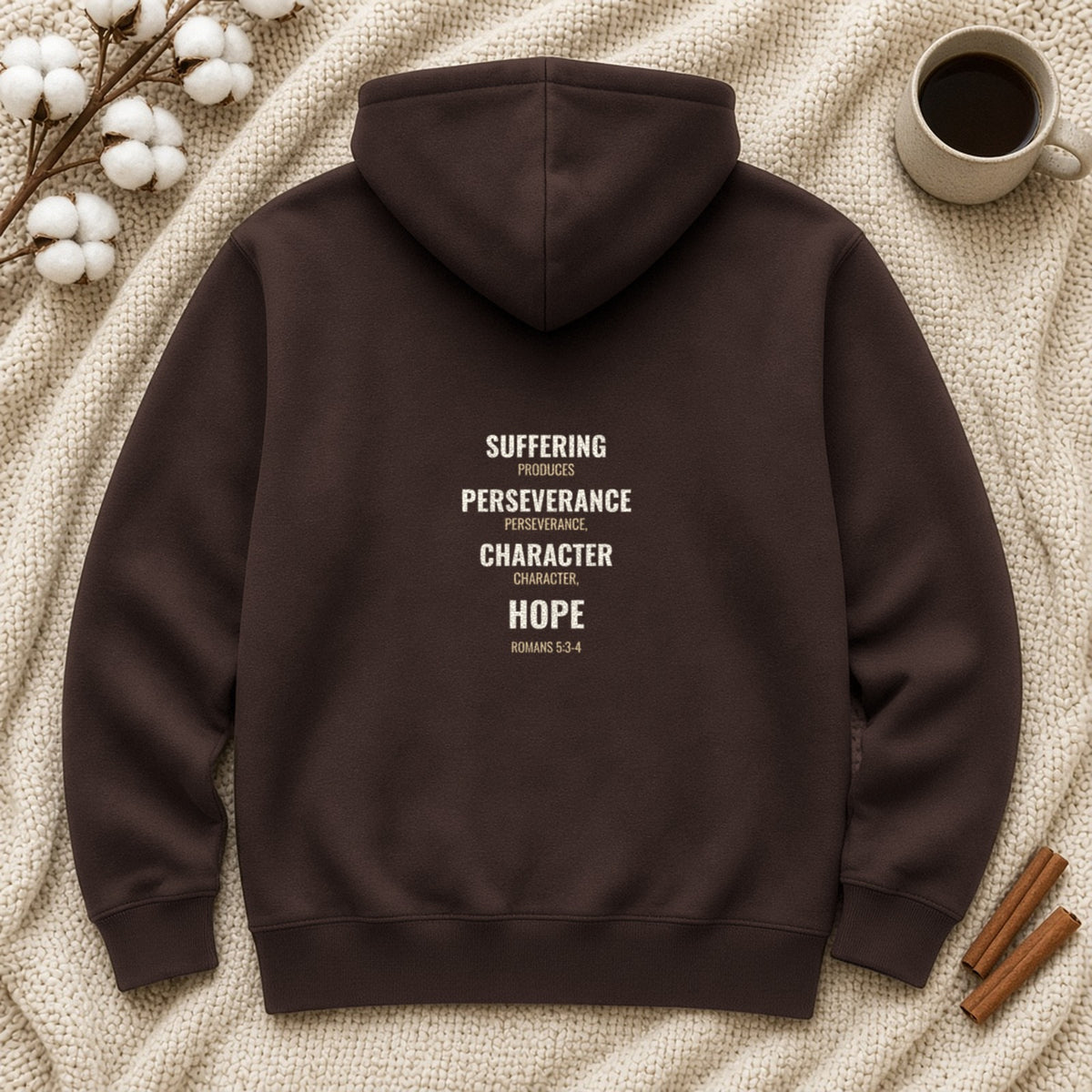 Suffering Produces Hope Romans 5:3-4 dark chocolate hoodie, flat lay (back view)