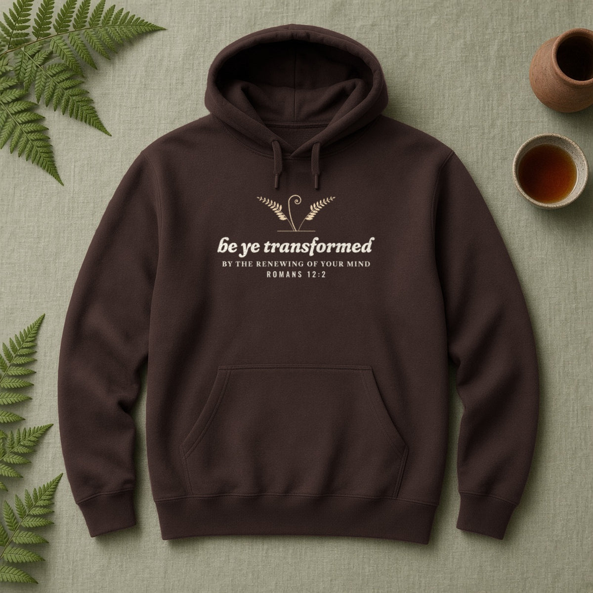 Be Transformed Romans 12:2 hoodie in Dark Chocolate, flat lay