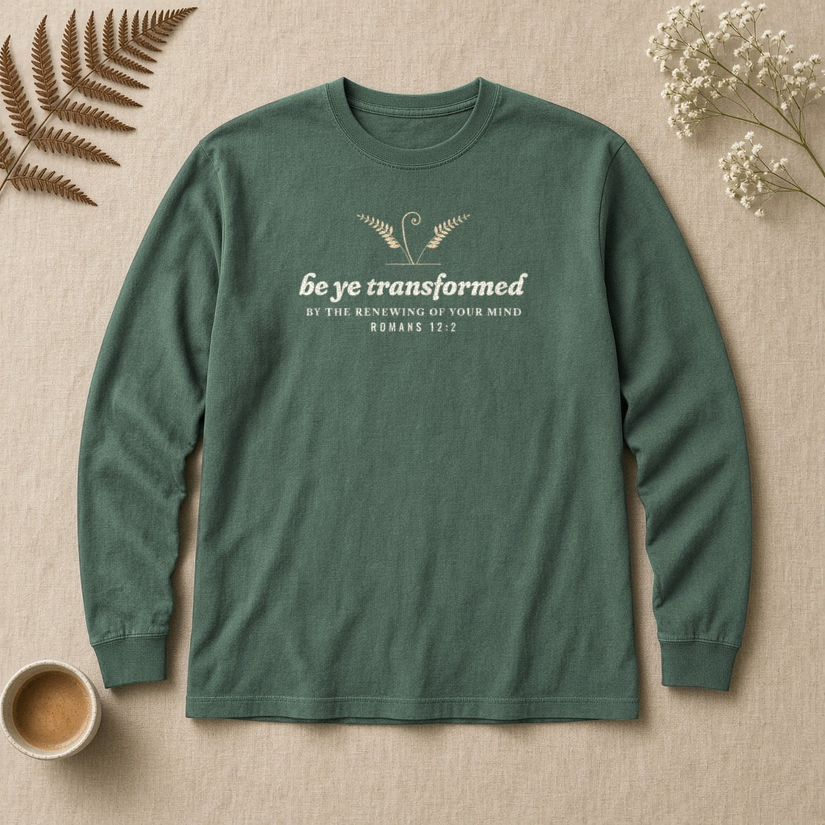 Be Transformed Romans 12:2 long sleeve tee in Blue Spruce, flat lay